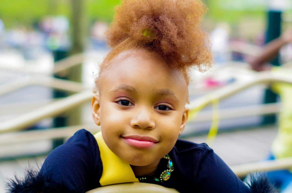 Girl in blue top focus photo