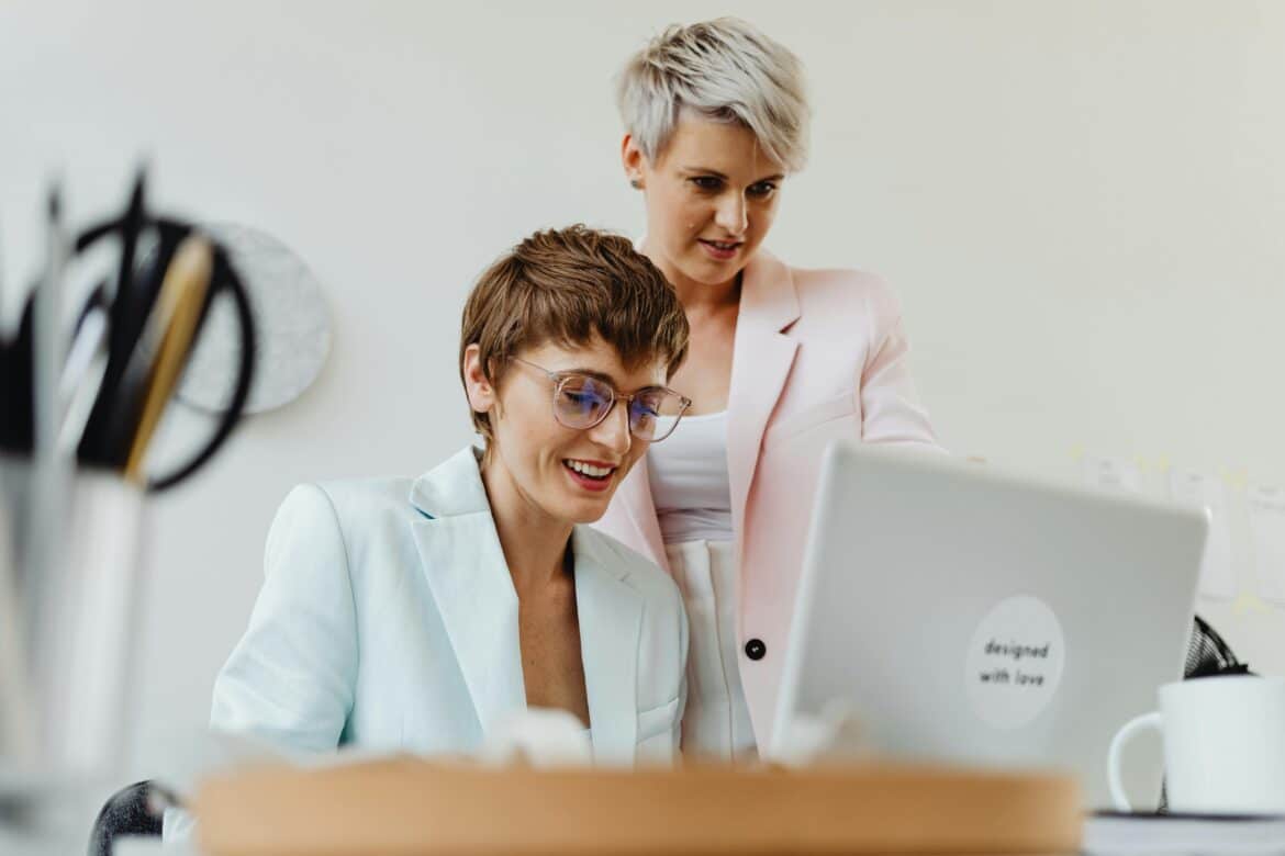 Woman in blazers using a laptop