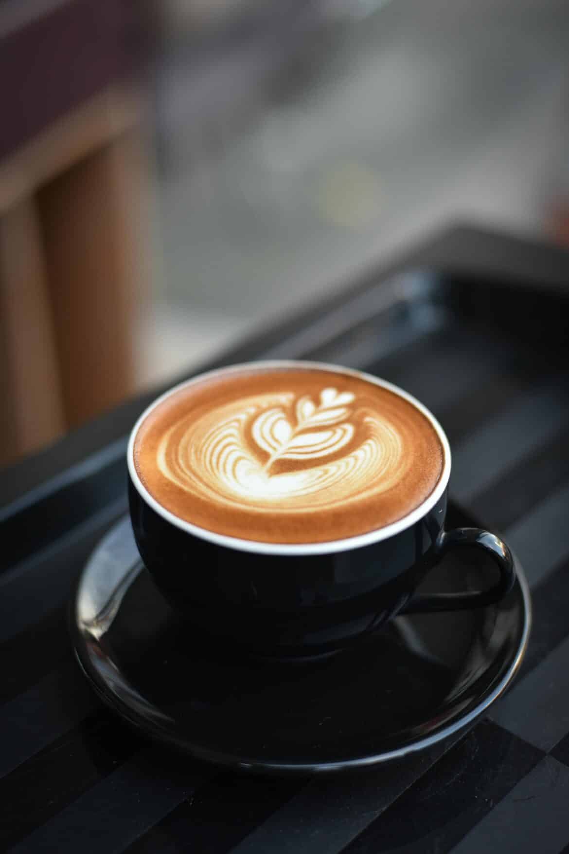 Close up of coffee cup on table