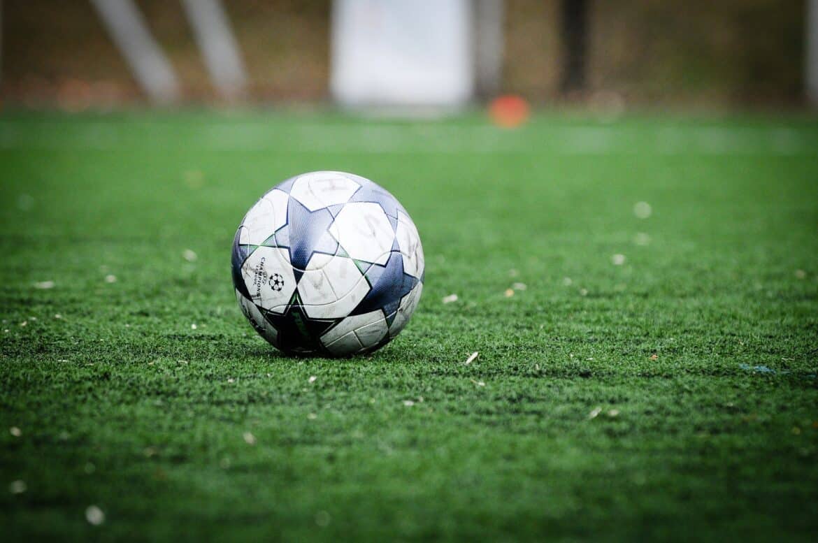 Football before a footballmatch between two junior teams. Football or soccer is huge in Sweden and way fields are available for everyone is simple unique.**Please add a link to https://danielnorin.com/ if you use the picture. Thanks!